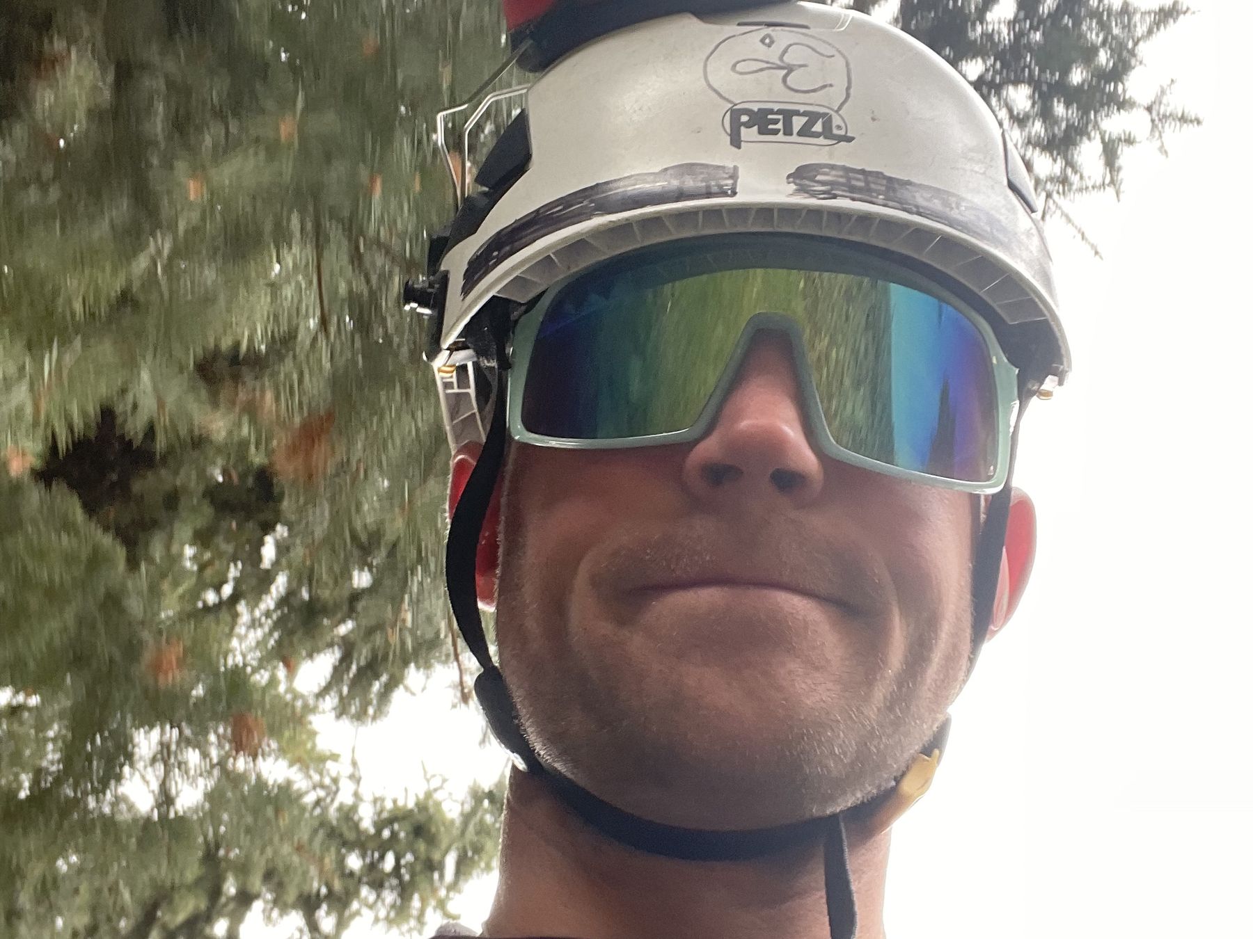Kryn Dykema of Boulder Tree Surgeon in climbing helmet